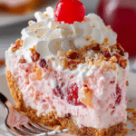 Millionaire pie recipe slice with creamy pineapple cherry filling, whipped topping, and graham cracker crust